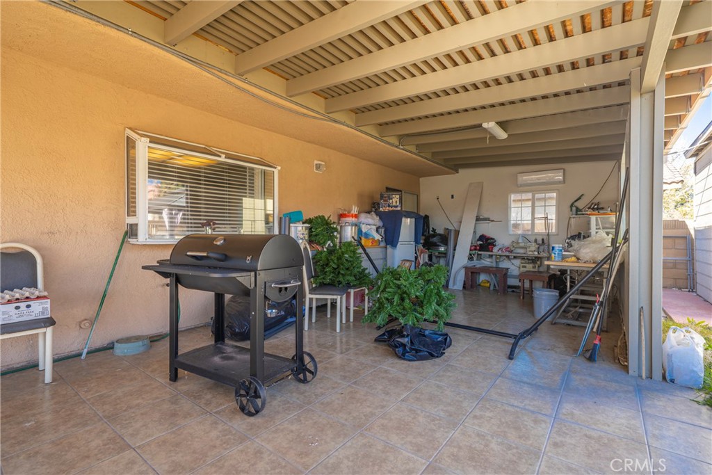 43922 Fallon Drive Lancaster, CA 93535 - Photo 24 of 36 a livingroom with furniture and a potted plant