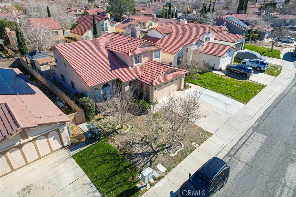 43922 Fallon Drive Lancaster, CA 93535 - Photo 33 of 36 a view of a house with yard and sitting area