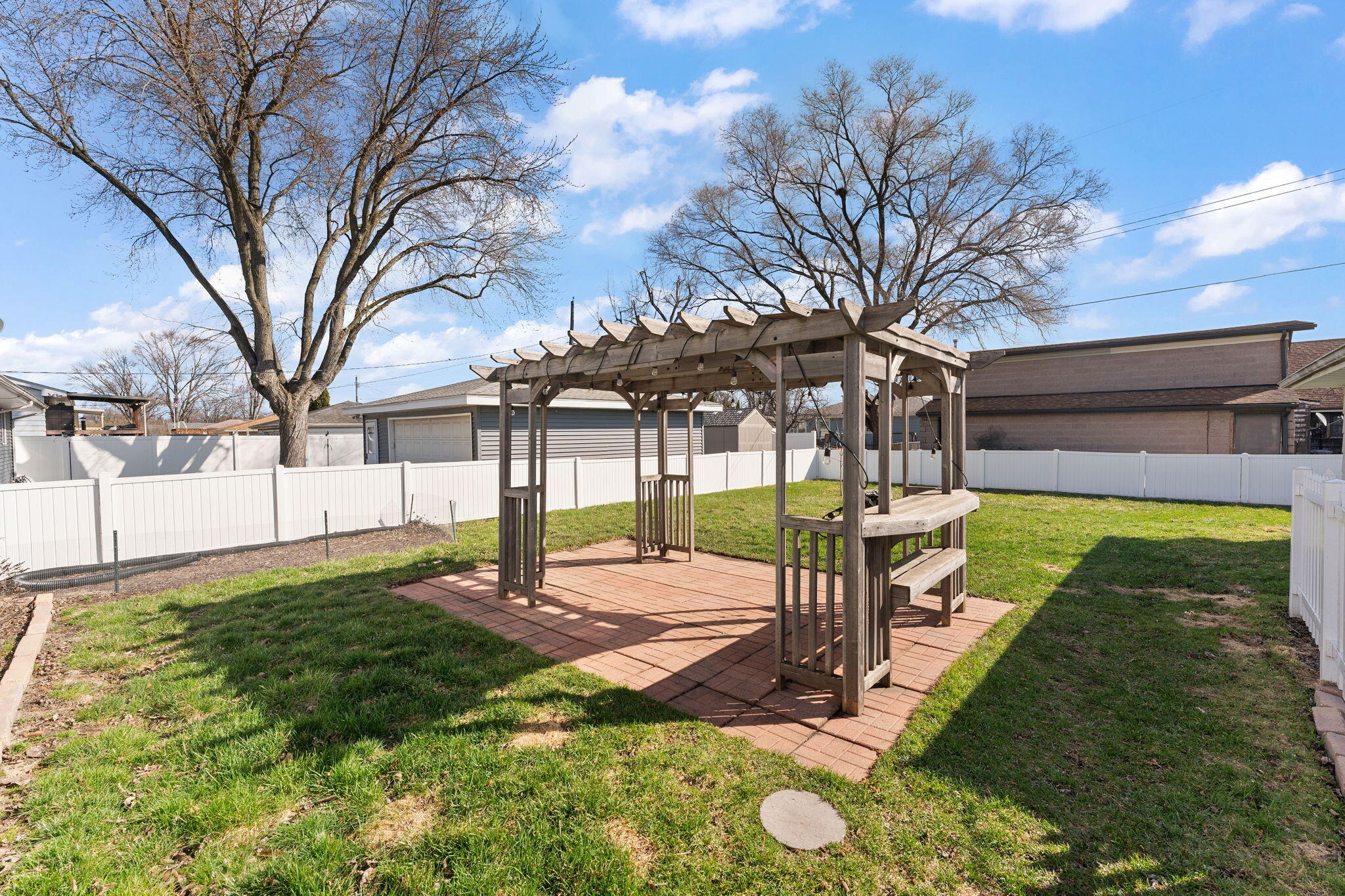 947 North Wood Street Griffith, IN 46319 - Photo 22 of 25 a view of a backyard with a garden