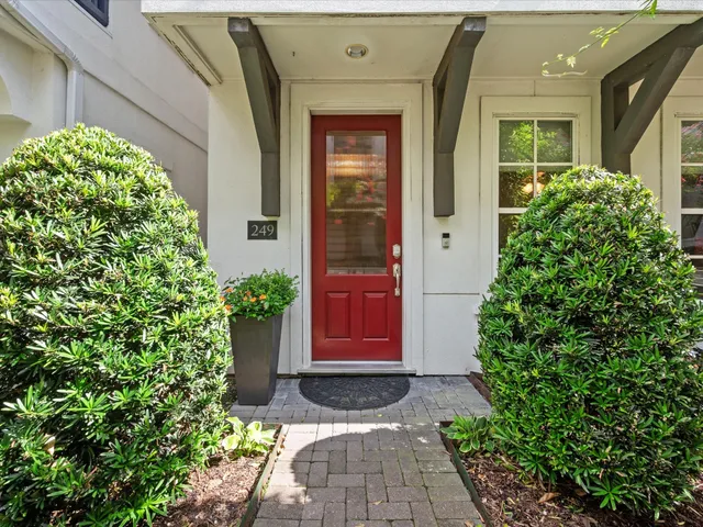 a view of entryway with wooden floor