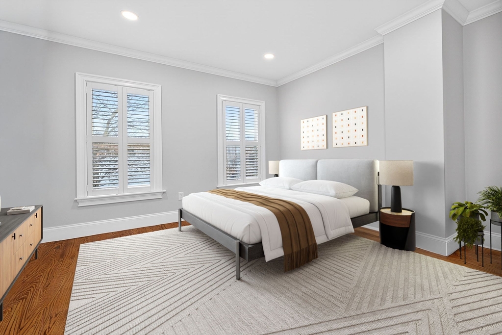 137 N Street, Unit 3 Boston, MA 02127 - Photo 14 of 28 a bedroom with bed and a window