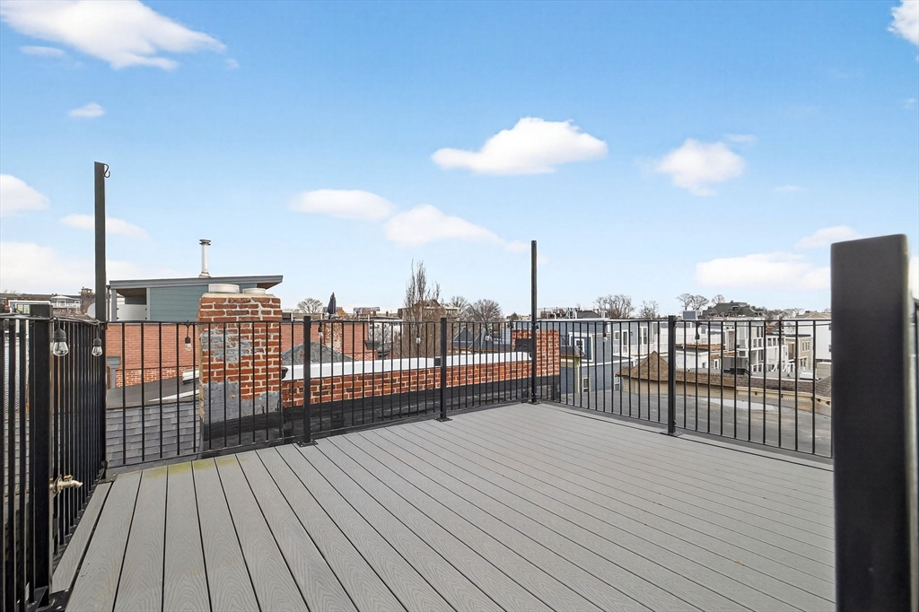137 N Street, Unit 3 Boston, MA 02127 - Photo 20 of 28 a view of roof deck with a barbeque
