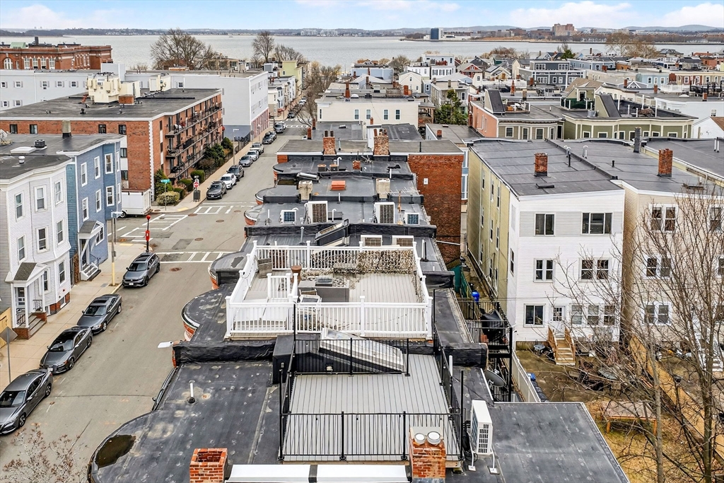 137 N Street, Unit 3 Boston, MA 02127 - Photo 22 of 28 a view of a city that has tall buildings