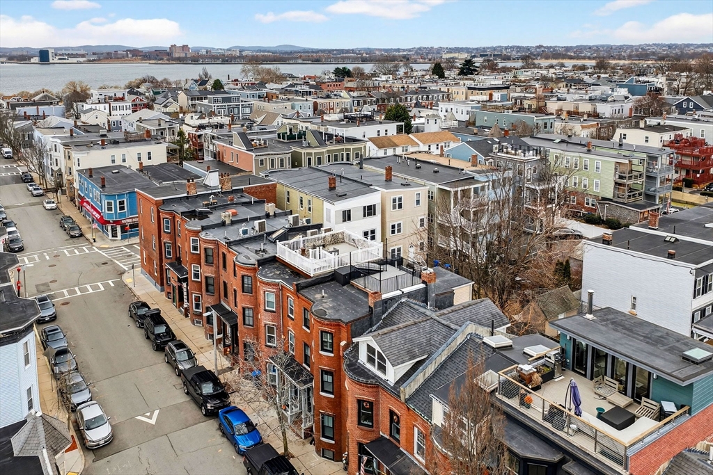 137 N Street, Unit 3 Boston, MA 02127 - Photo 23 of 28 an aerial view of a building with an outdoor space