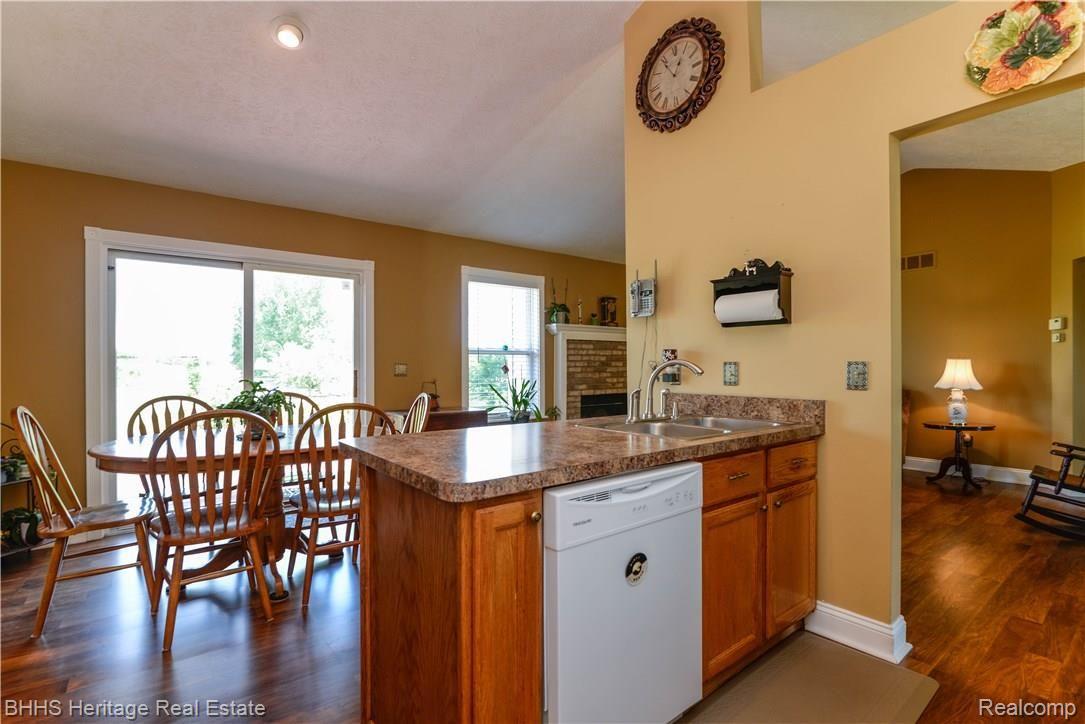 10100 Chase Lake Road Fowlerville, MI 48836 - Photo 14 of 41 Converse While You Cook