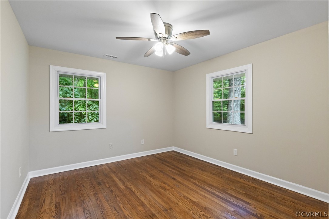 6286 McClellan Road Mechanicsville, VA 23111 - Photo 13 of 29 wooden floor in an empty room with a window