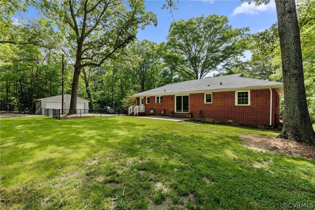 6286 McClellan Road Mechanicsville, VA 23111 - Photo 26 of 29 a house view with a garden space