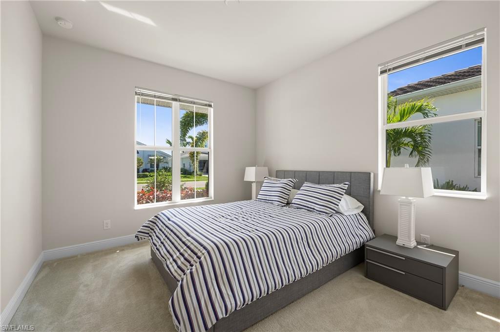 8897 Redonda Drive Naples, FL 34114 - Photo 22 of 42 Carpeted bedroom featuring baseboards