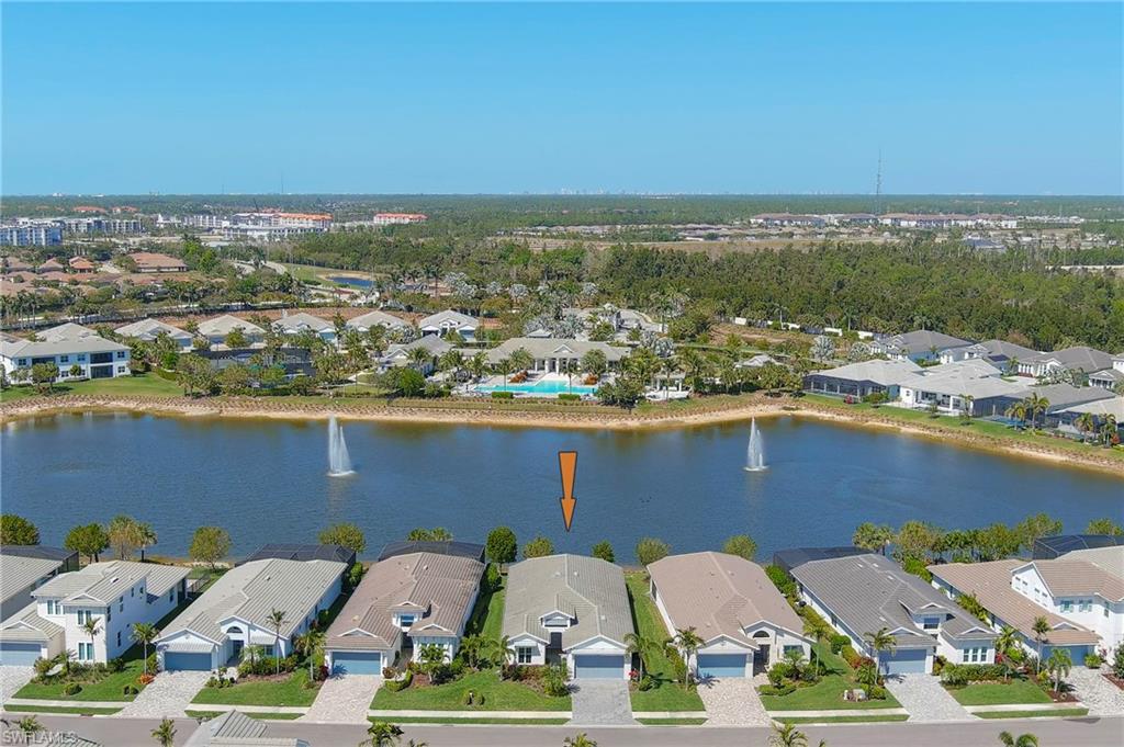 8897 Redonda Drive Naples, FL 34114 - Photo 3 of 42 Aerial view of residential area featuring a nearby body of water