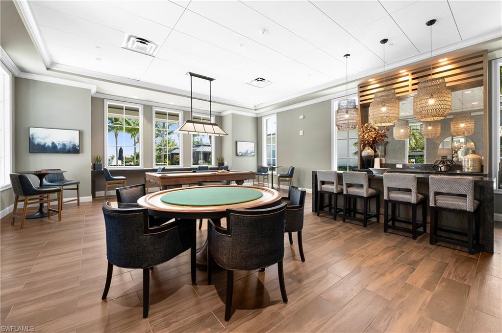 8897 Redonda Drive Naples, FL 34114 - Photo 36 of 42 Rec room featuring ornamental molding