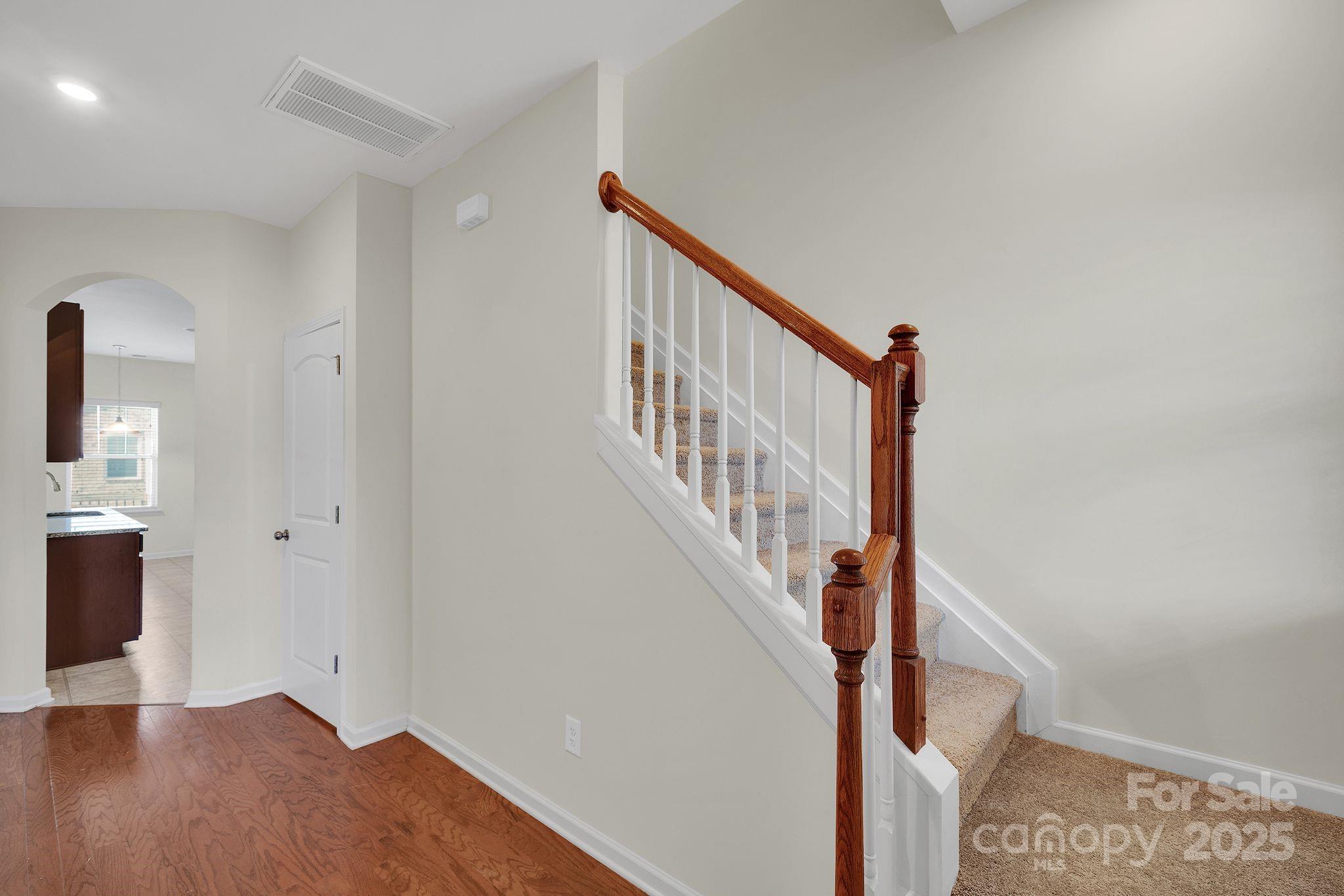 6439 Prosperity Church Road Charlotte, NC 28269 - Photo 21 of 46 a view of entryway with wooden floor