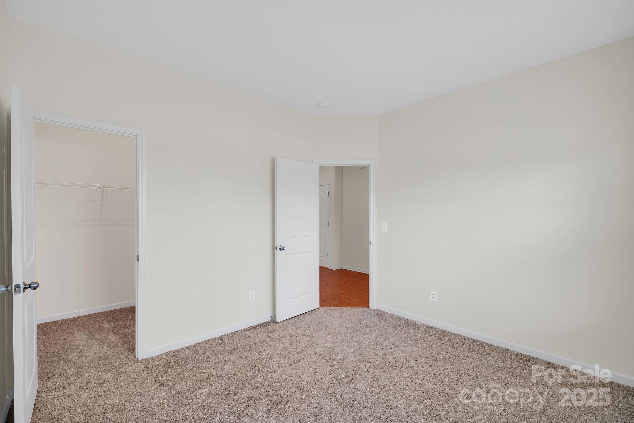 6439 Prosperity Church Road Charlotte, NC 28269 - Photo 30 of 46 a view of an empty room and entryway