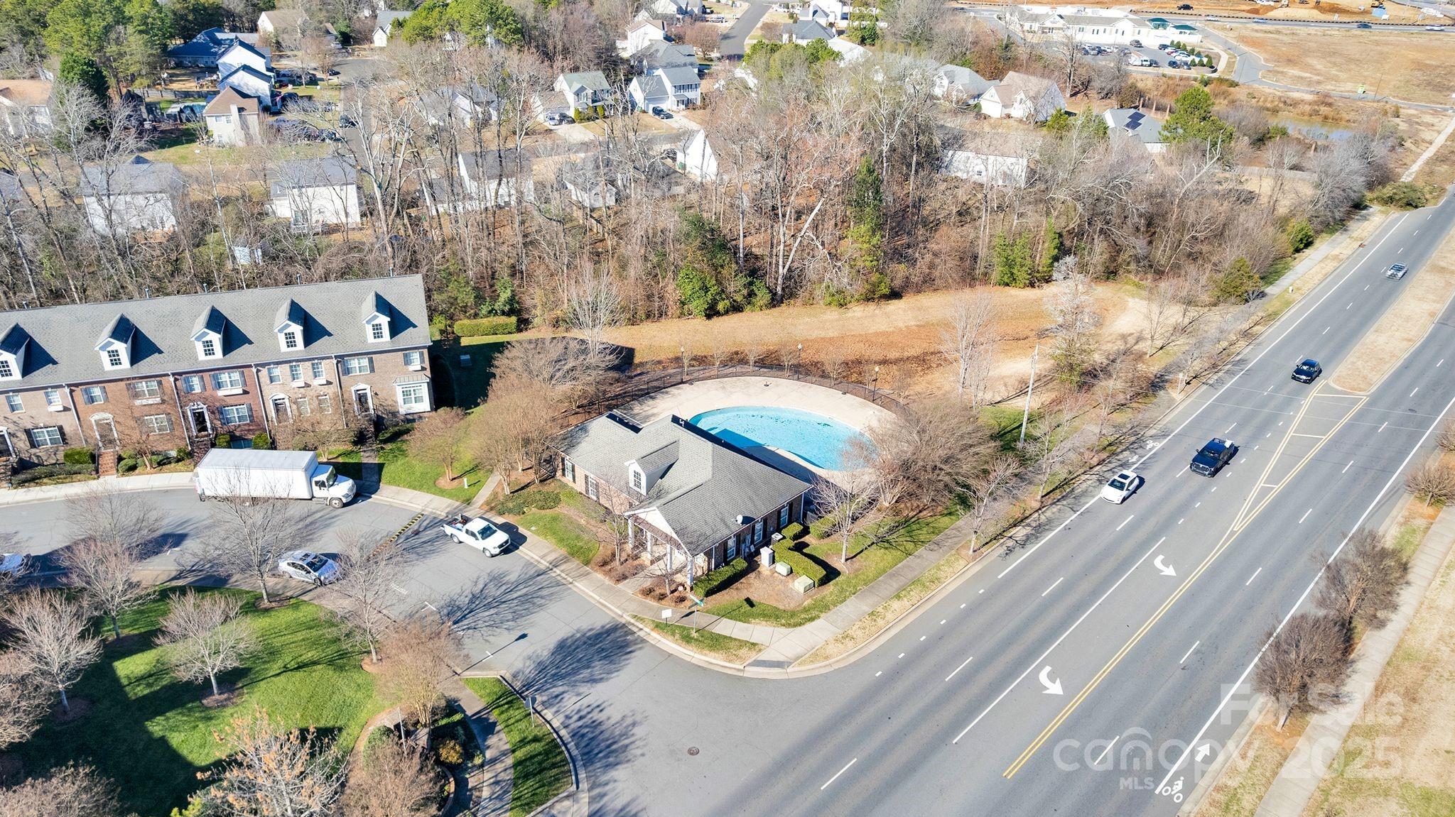 6439 Prosperity Church Road Charlotte, NC 28269 - Photo 43 of 46 a view of a terrace with furniture