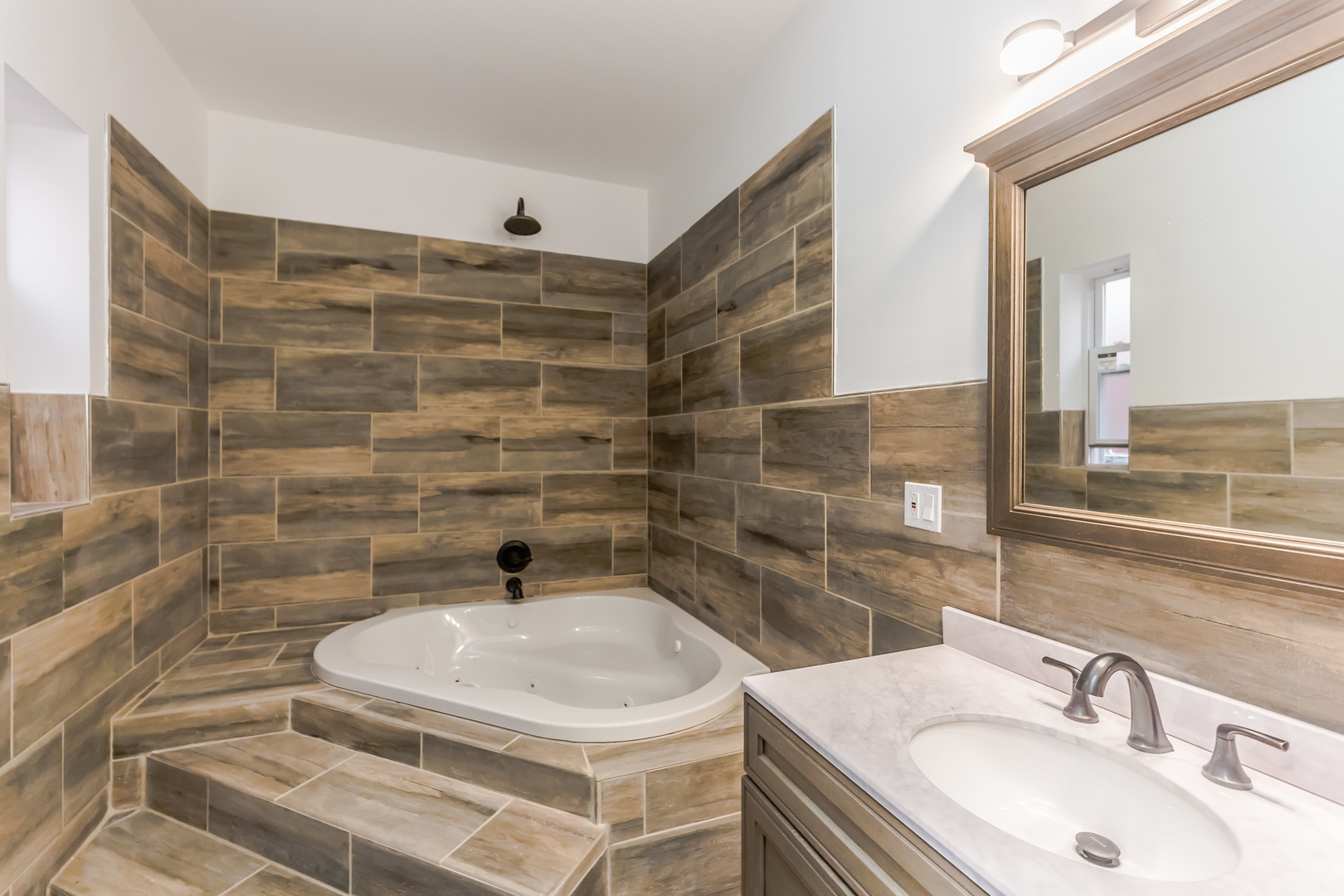 352 North Avers Avenue Chicago, IL 60624 - Photo 14 of 18 a bathroom with a sink and a mirror