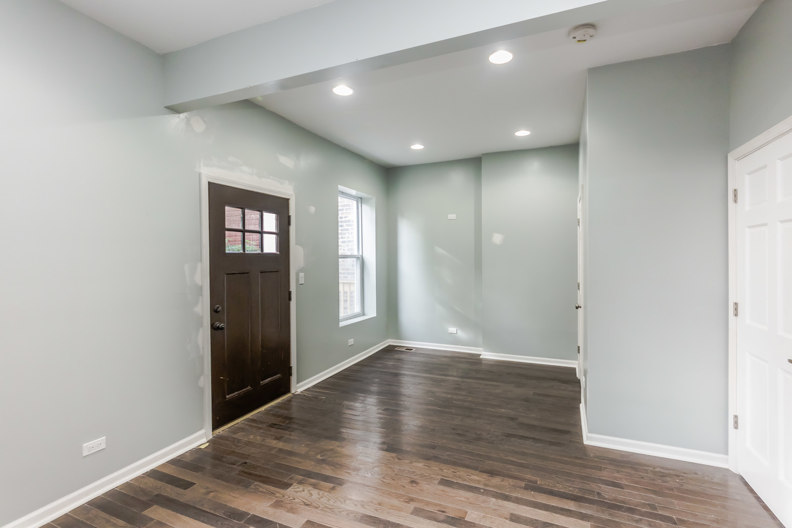 352 North Avers Avenue Chicago, IL 60624 - Photo 15 of 18 a view of wooden floor and windows in an empty room