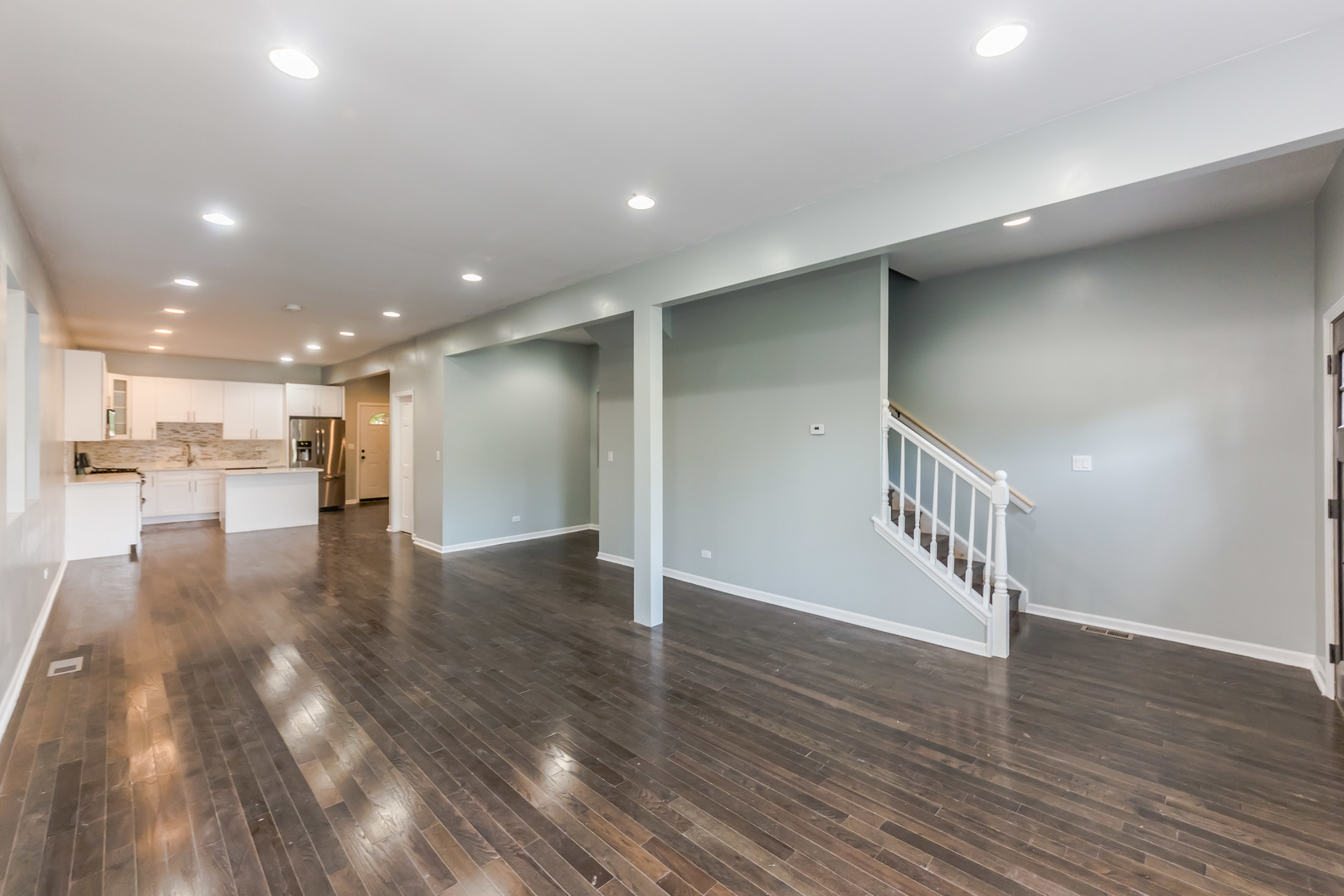 352 North Avers Avenue Chicago, IL 60624 - Photo 2 of 18 a view of an empty room with wooden floor