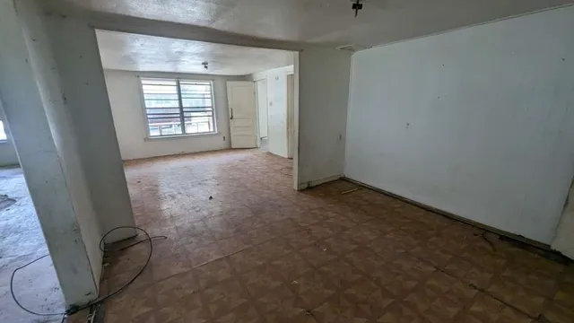 an empty room with windows