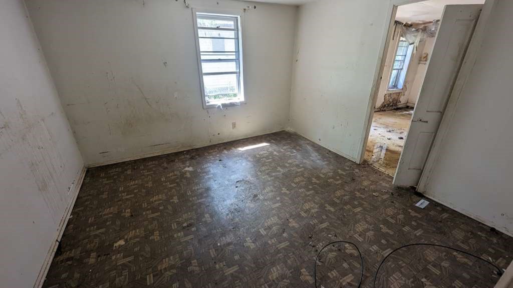 2319 Luther Street Tyler, TX 75701 - Photo 5 of 10 an empty room with windows