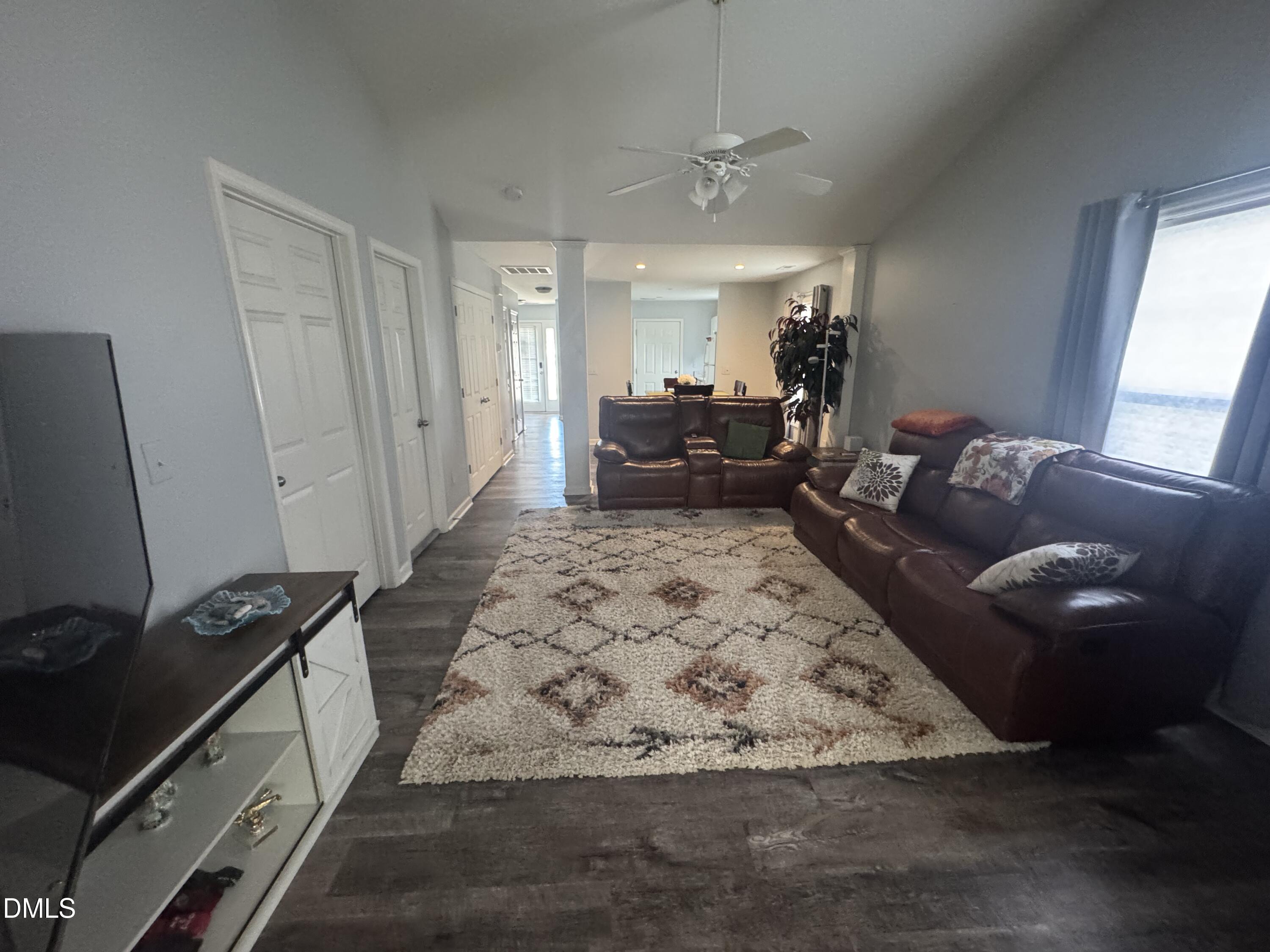 11351 Clubhaven Place, Unit 100 Raleigh, NC 27617 - Photo 14 of 29 a living room with furniture rug and window