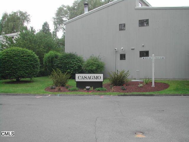 23 Olcott Way Ridgefield, CT 06877 - Photo 1 of 1 a view of a house with a yard and potted plants