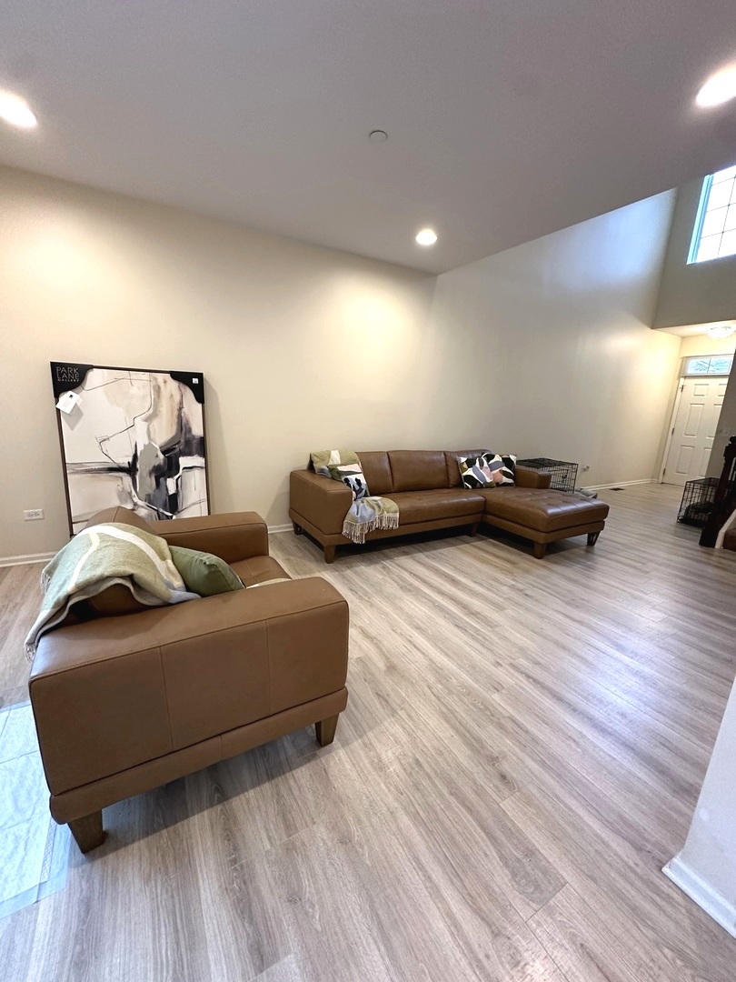 5102 Monroe Street Matteson, IL 60443 - Photo 9 of 54 a living room with furniture and a wooden floor