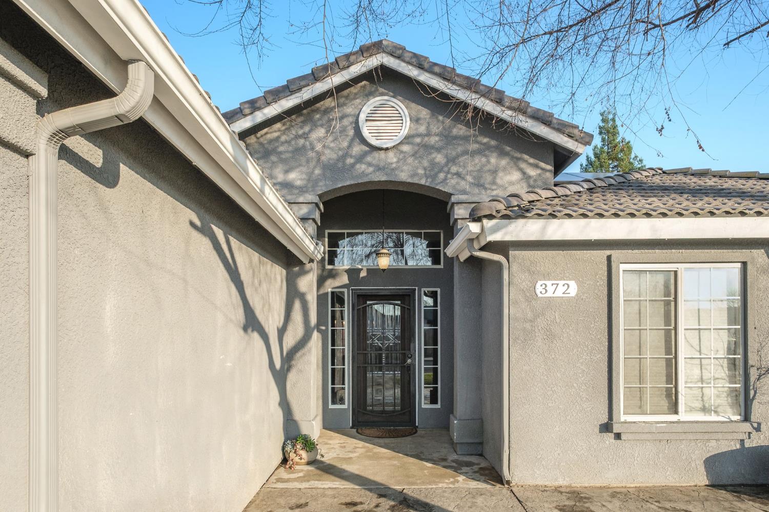 372 Lily Avenue Sanger, CA 93657 - Photo 2 of 30 a view of a entryway door of the house