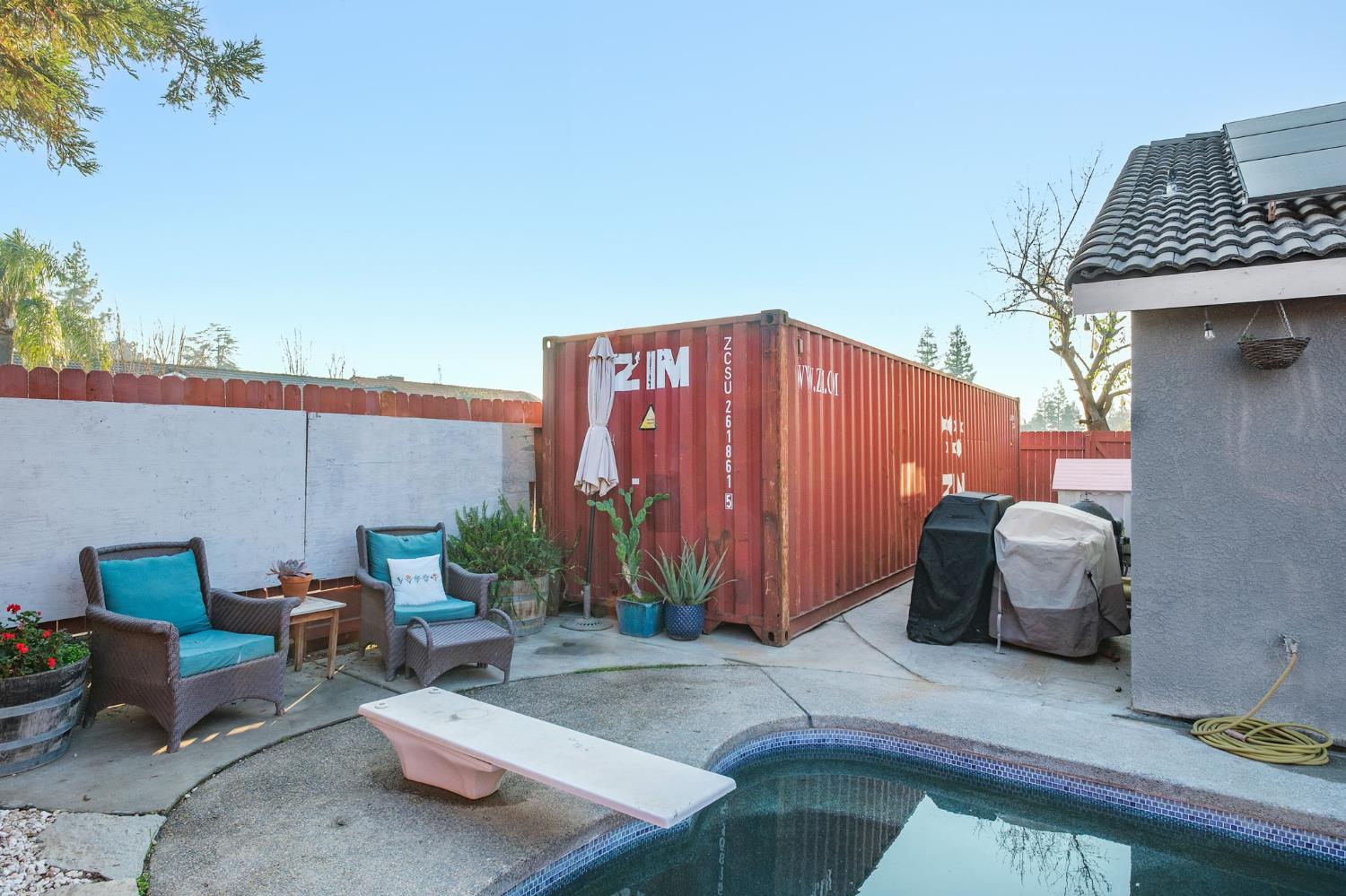 372 Lily Avenue Sanger, CA 93657 - Photo 27 of 30 a backyard of a house with outdoor seating