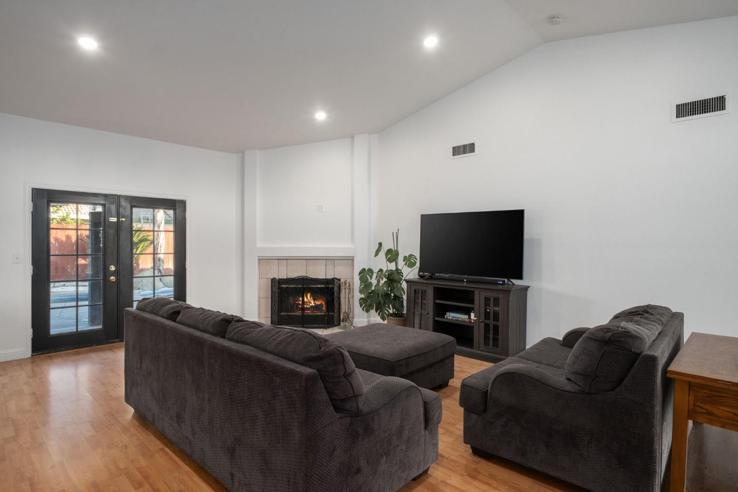 372 Lily Avenue Sanger, CA 93657 - Photo 5 of 30 a living room with furniture and a flat screen tv