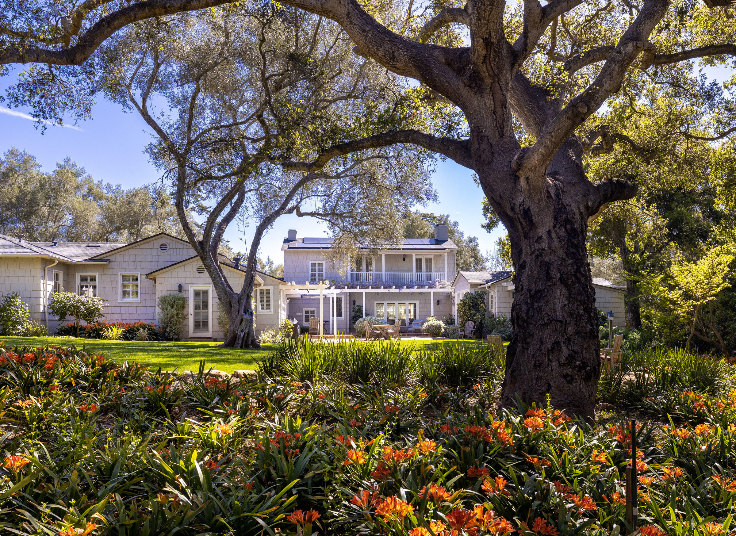 645-675 Olive Road Montecito, CA 93108 - Photo 1 of 34 a front view of a house with a yard