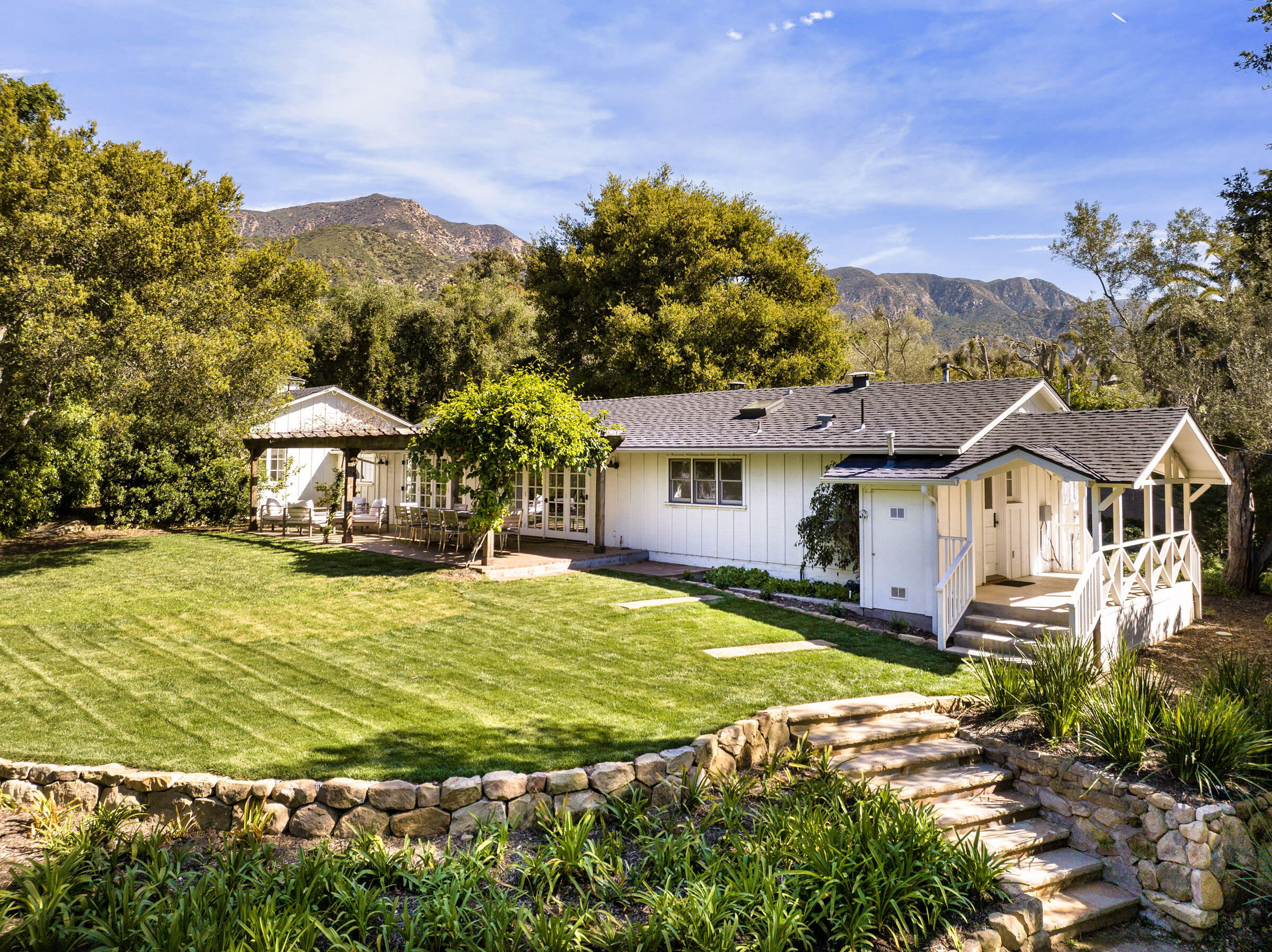 645-675 Olive Road Montecito, CA 93108 - Photo 26 of 34 a front view of a house with a yard