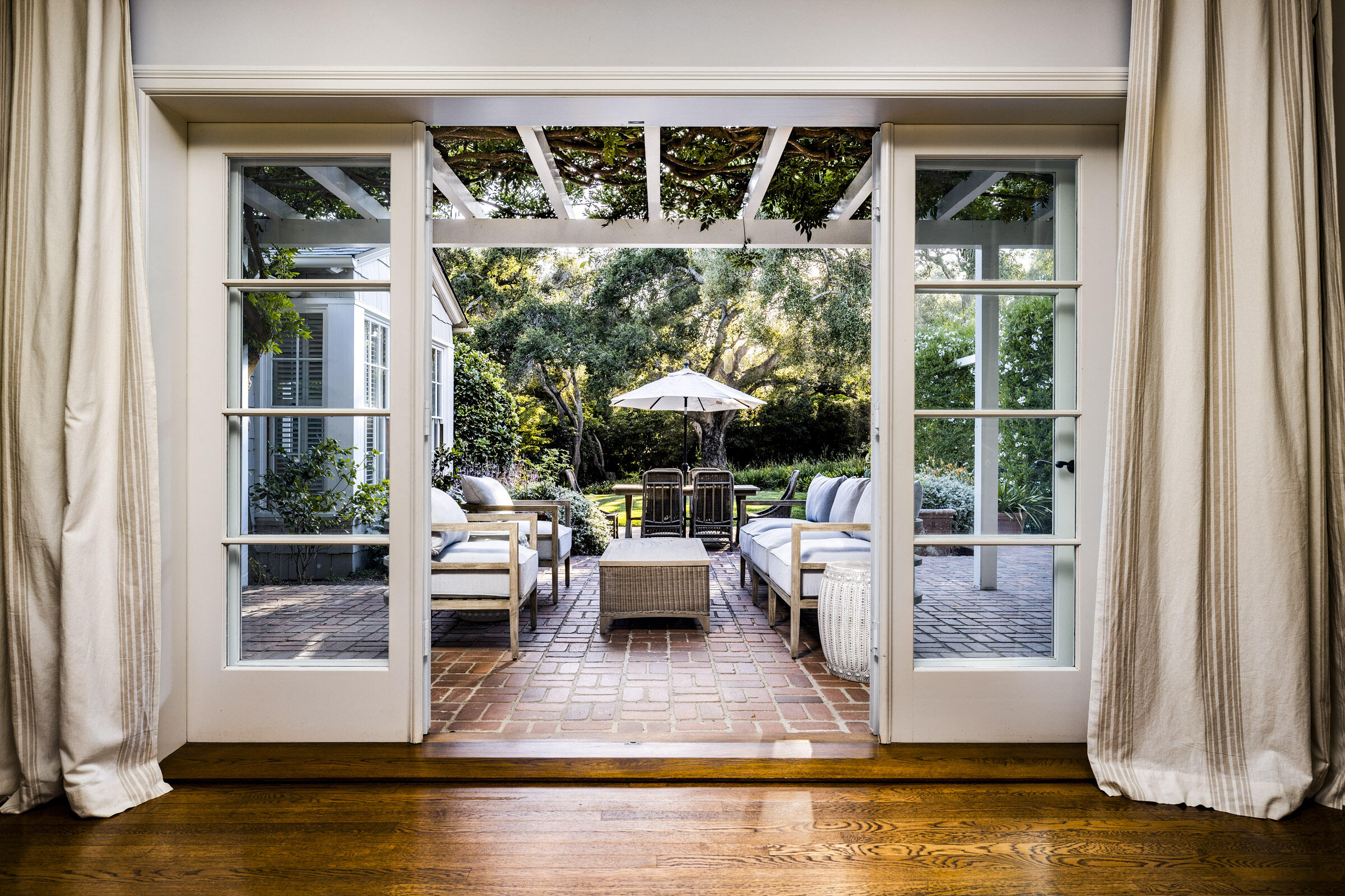 645-675 Olive Road Montecito, CA 93108 - Photo 6 of 34 a living room with furniture and a large window