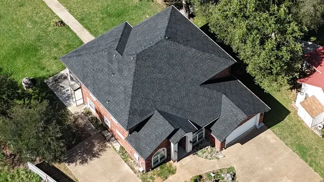 a backyard of a house with lots of green space
