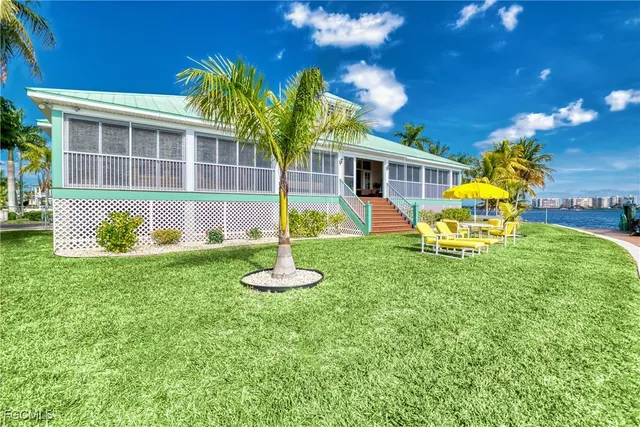 a view of yard with patio