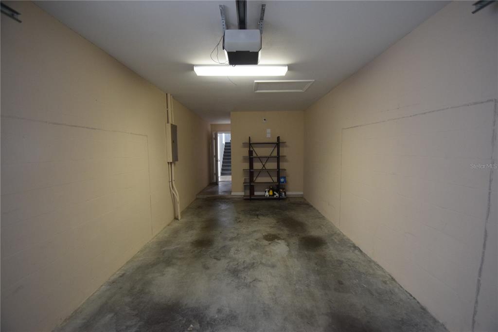 534 Grasslands Village Circle, Unit 534 Lakeland, FL 33803 - Photo 34 of 35 an empty room with a empty space and windows