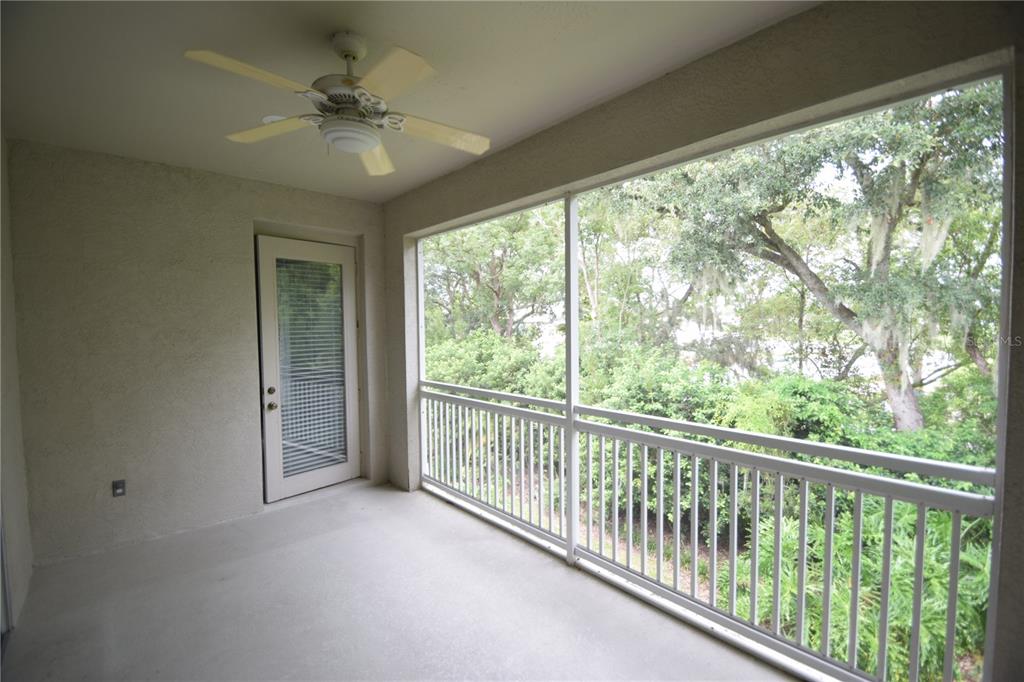 534 Grasslands Village Circle, Unit 534 Lakeland, FL 33803 - Photo 8 of 35 a view of a room that has a large window