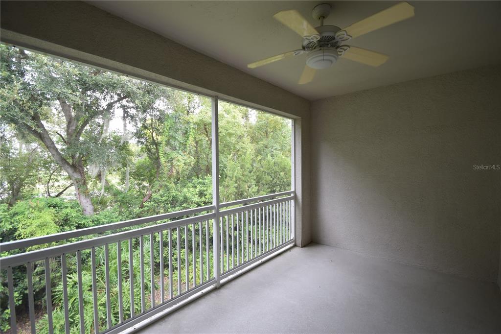534 Grasslands Village Circle, Unit 534 Lakeland, FL 33803 - Photo 9 of 35 a view of a balcony with a large window