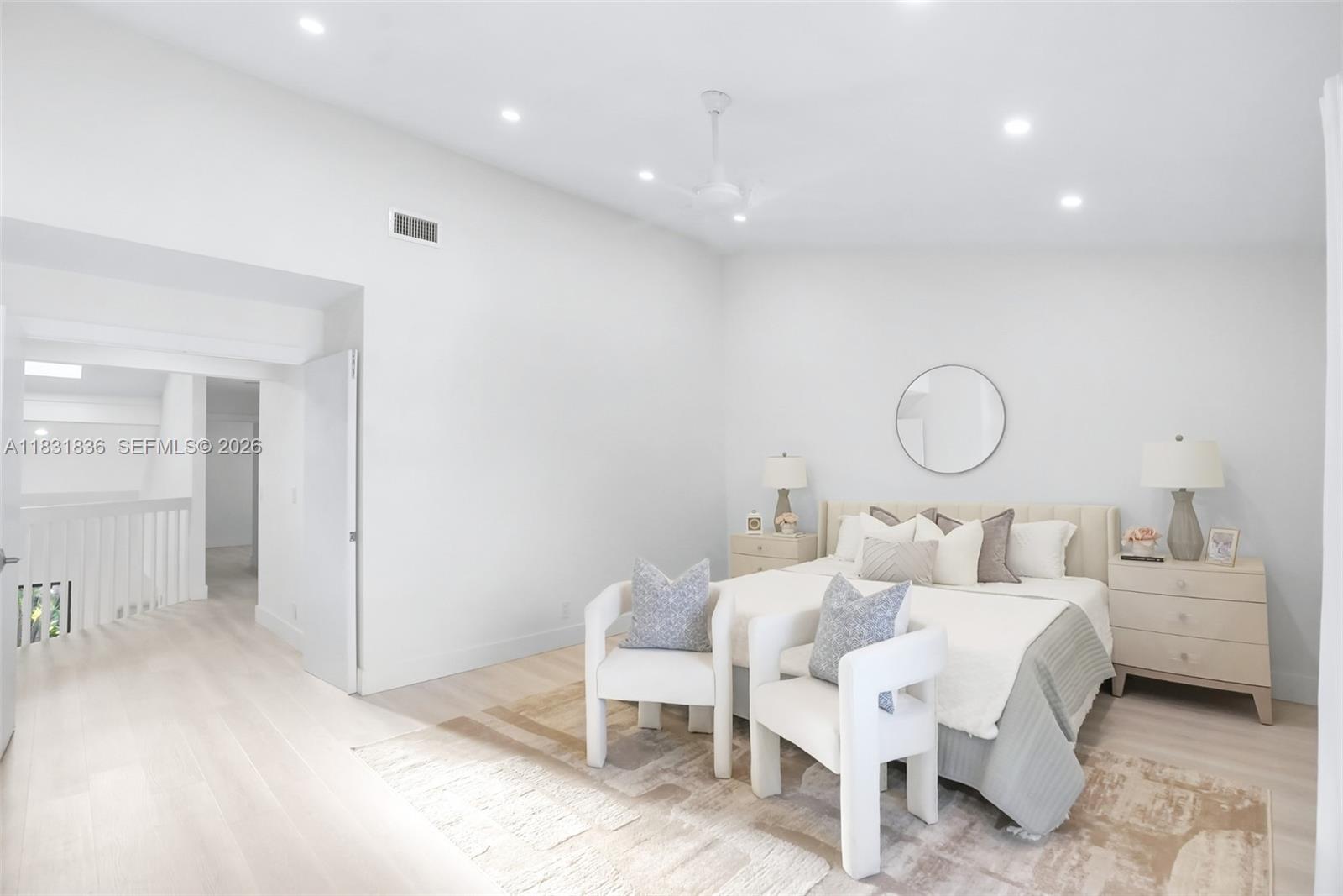 7829 La Mirada Drive Boca Raton, FL 33433 - Photo 11 of 26 a bed room with a bed and mirror