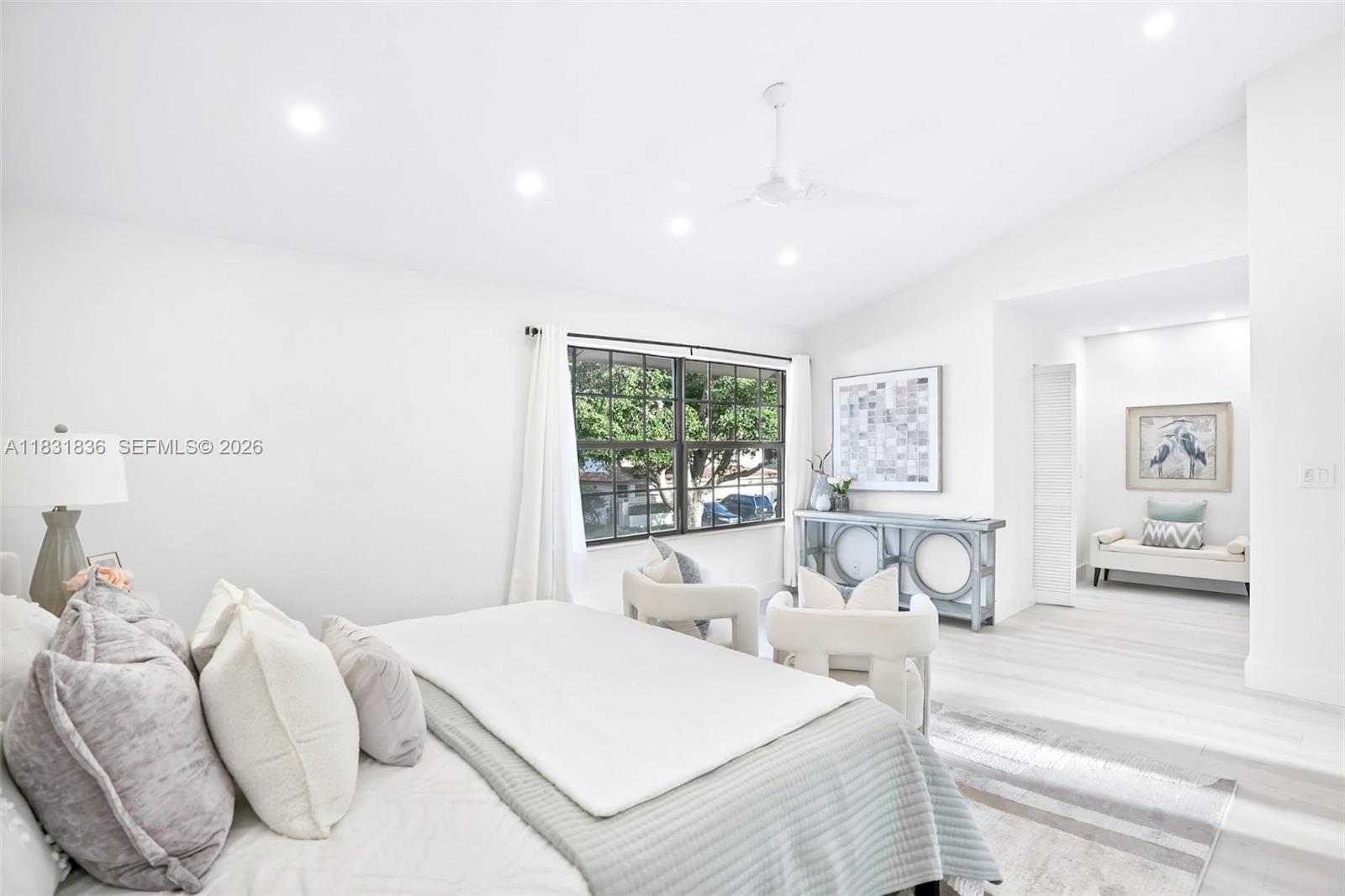 7829 La Mirada Drive Boca Raton, FL 33433 - Photo 13 of 26 a large white bed in a white room