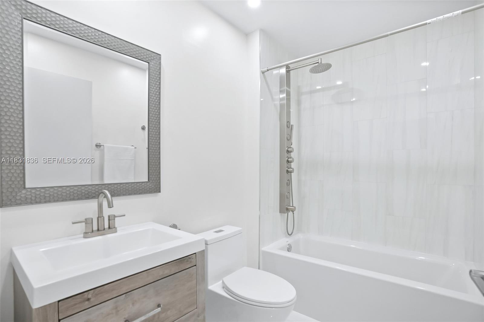 7829 La Mirada Drive Boca Raton, FL 33433 - Photo 18 of 26 a bathroom with a sink toilet and shower