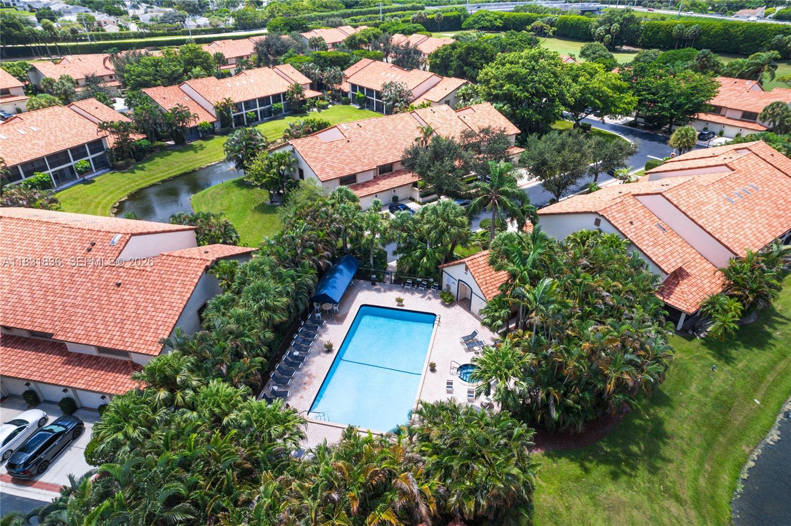 7829 La Mirada Drive Boca Raton, FL 33433 - Photo 23 of 26 an aerial view of house with yard swimming pool and outdoor seating