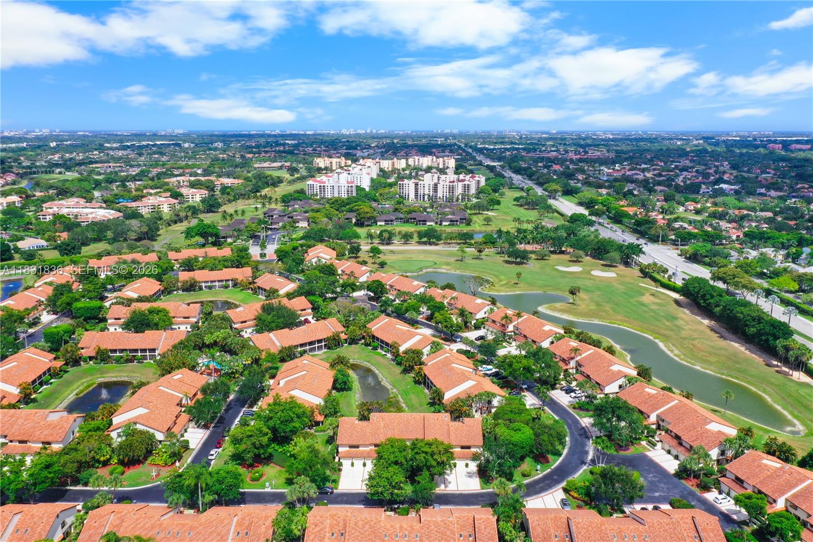 7829 La Mirada Drive Boca Raton, FL 33433 - Photo 24 of 26 an aerial view of residential houses with outdoor space