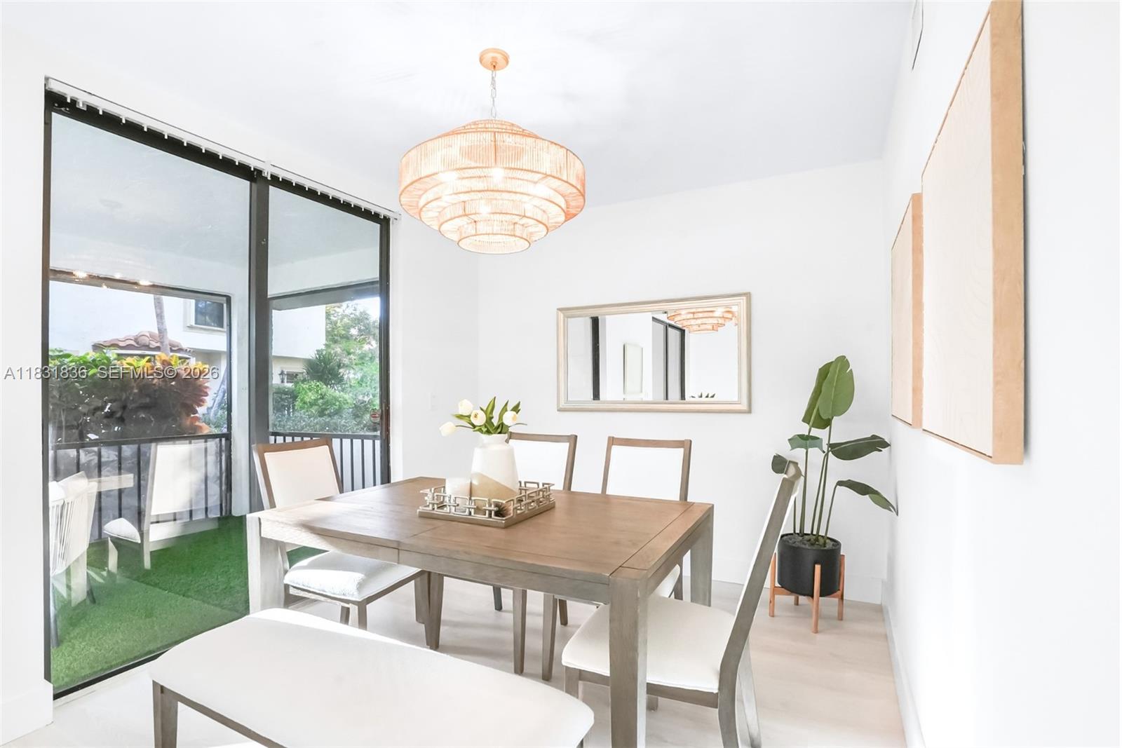 7829 La Mirada Drive Boca Raton, FL 33433 - Photo 7 of 26 a view of a dining room with furniture window and outside view