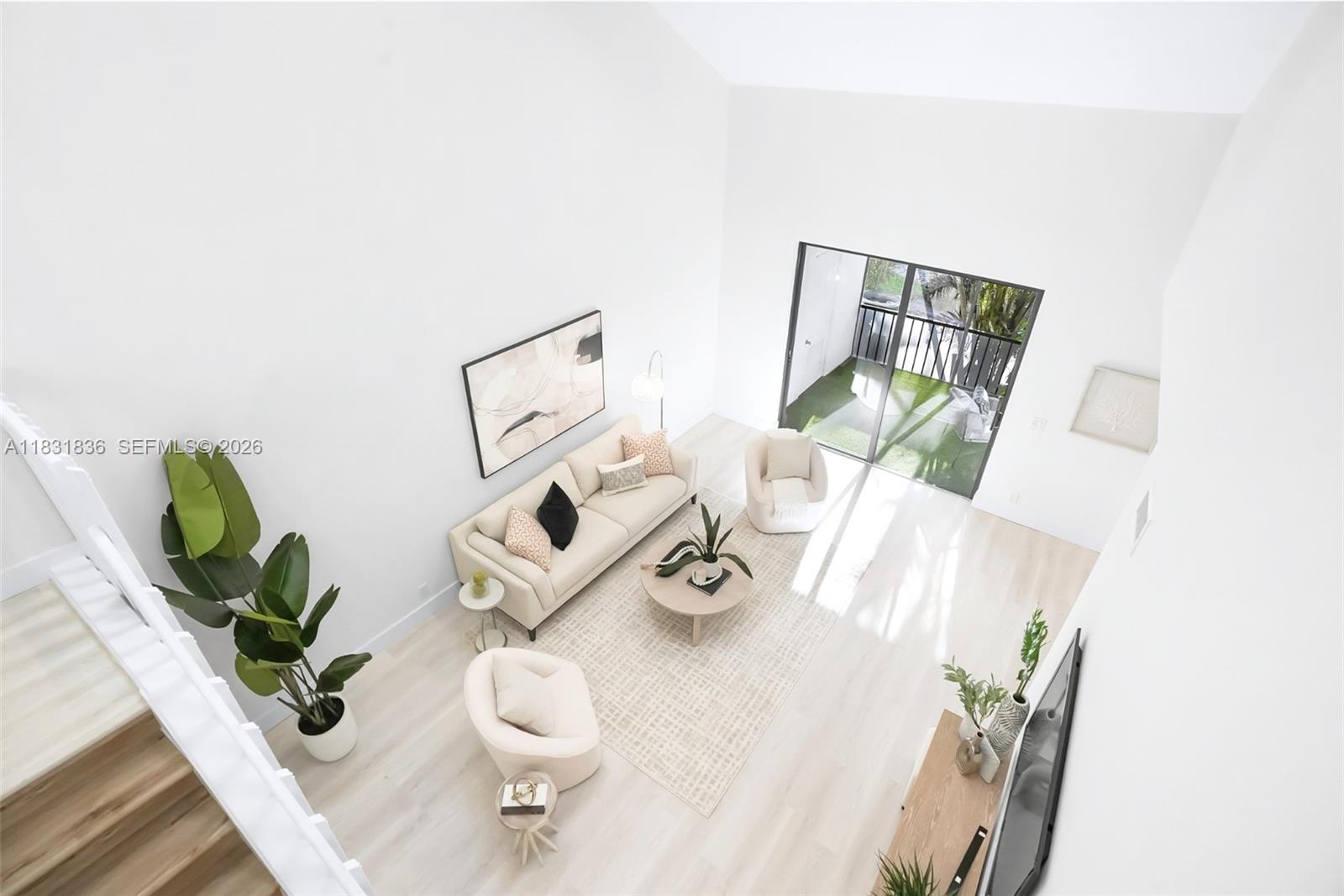 7829 La Mirada Drive Boca Raton, FL 33433 - Photo 10 of 26 a living room with furniture and white floor