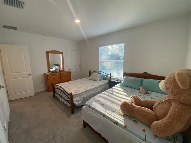 a bathroom with a shower curtain and a shower curtain