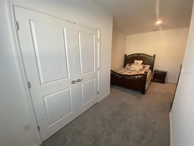 a bathroom with a shower and a toilet