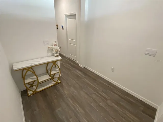 a view of a bathroom from a hallway