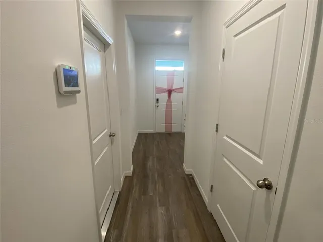 a kitchen with a sink a stove and cabinets