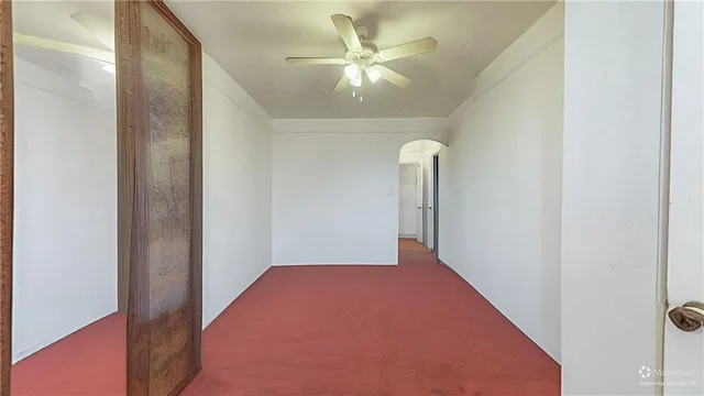 a kitchen with a sink and a refrigerator