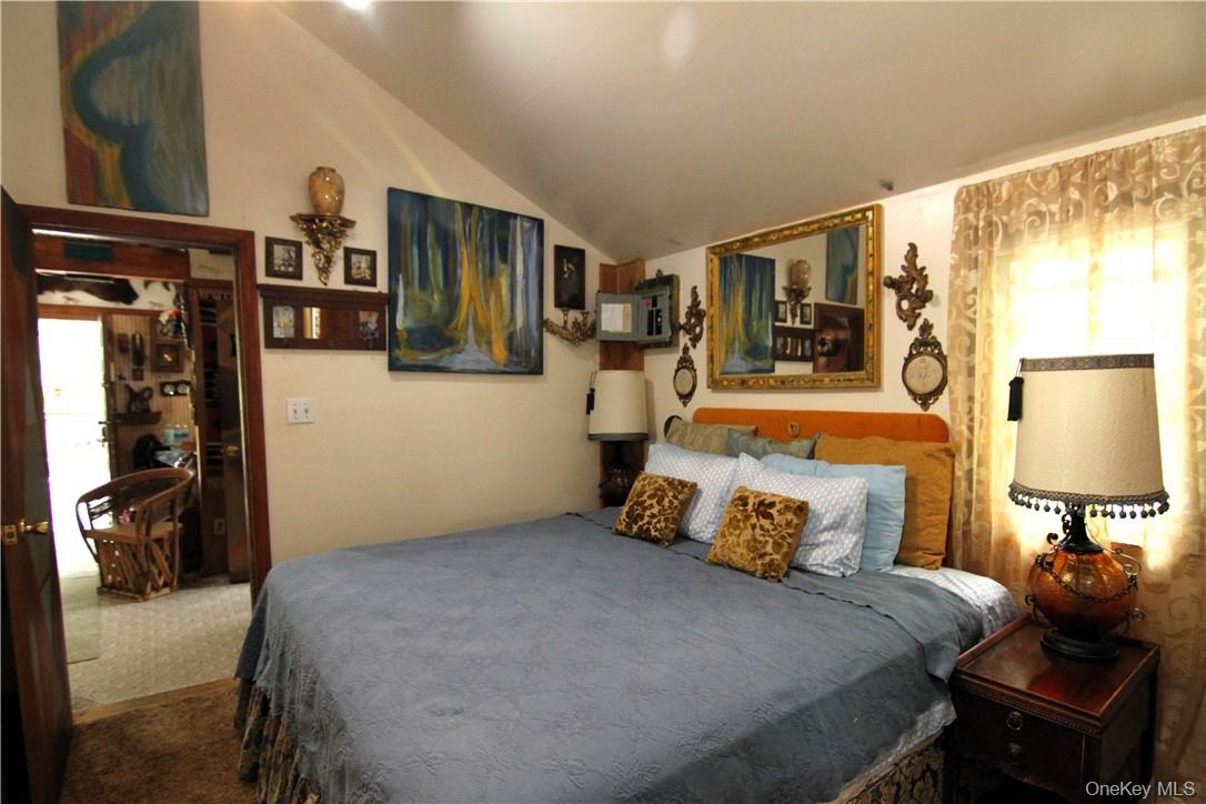 71 Miller Road, Unit 14 Hopewell Junction, NY 12533 - Photo 12 of 21 a bedroom with a bed and walk in closet