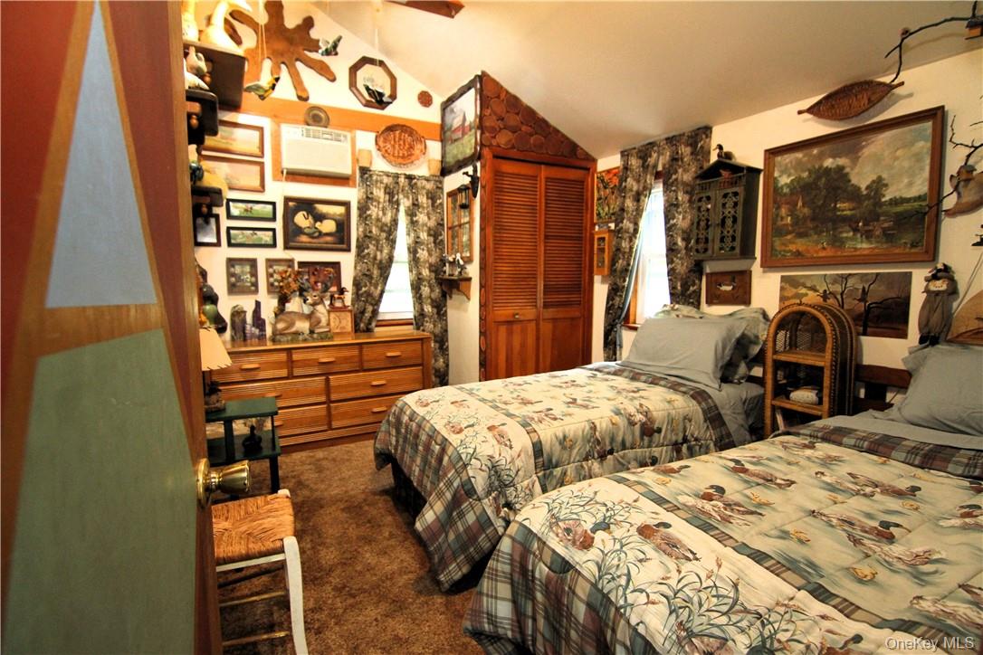 71 Miller Road, Unit 14 Hopewell Junction, NY 12533 - Photo 17 of 21 a bedroom with two beds and a window